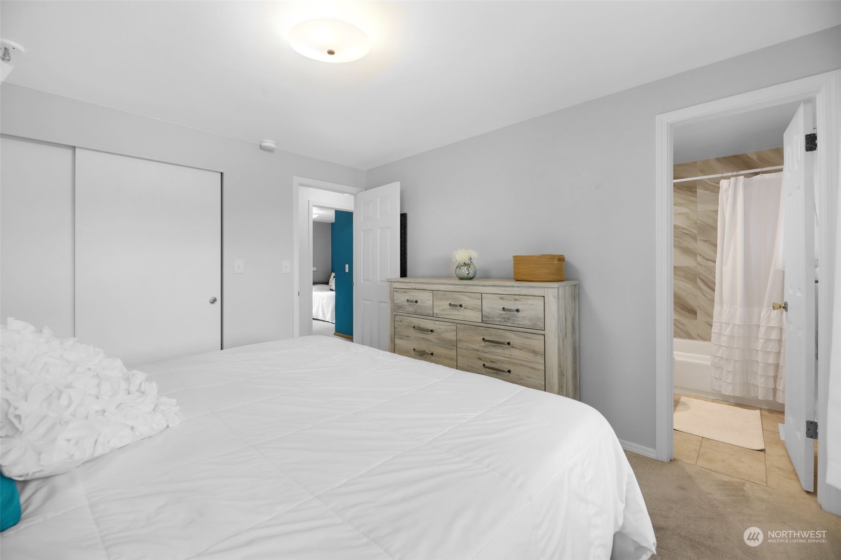 525 222nd Street Southwest Bothell, WA 98021 - Photo 15 of 25 a bedroom with a bed and a dresser