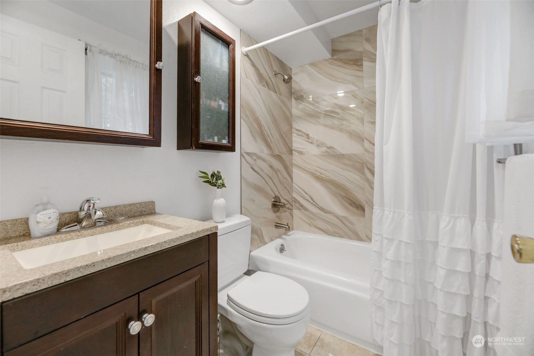 525 222nd Street Southwest Bothell, WA 98021 - Photo 16 of 25 a bathroom with a granite countertop sink toilet and shower