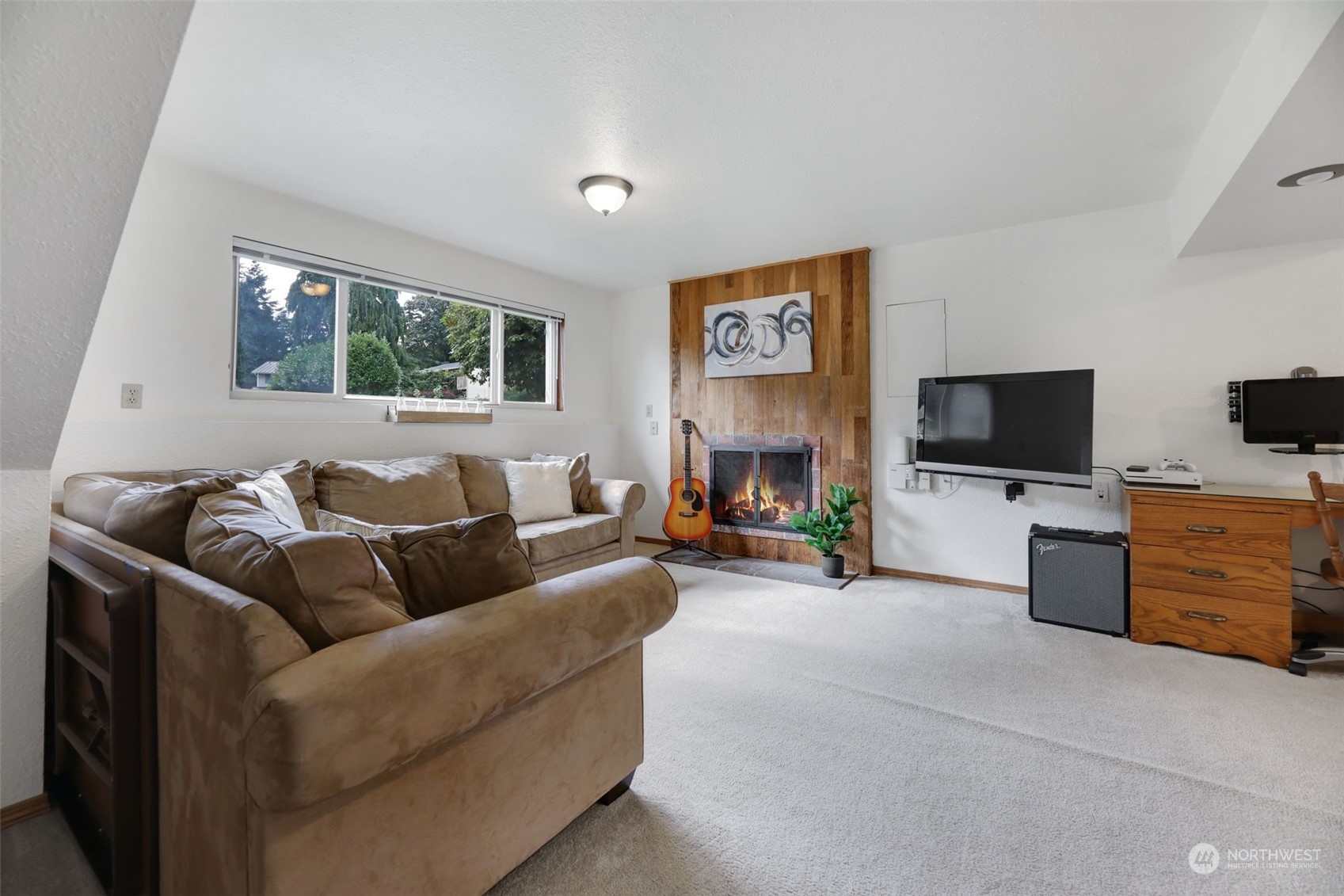525 222nd Street Southwest Bothell, WA 98021 - Photo 17 of 25 a living room with furniture and a flat screen tv
