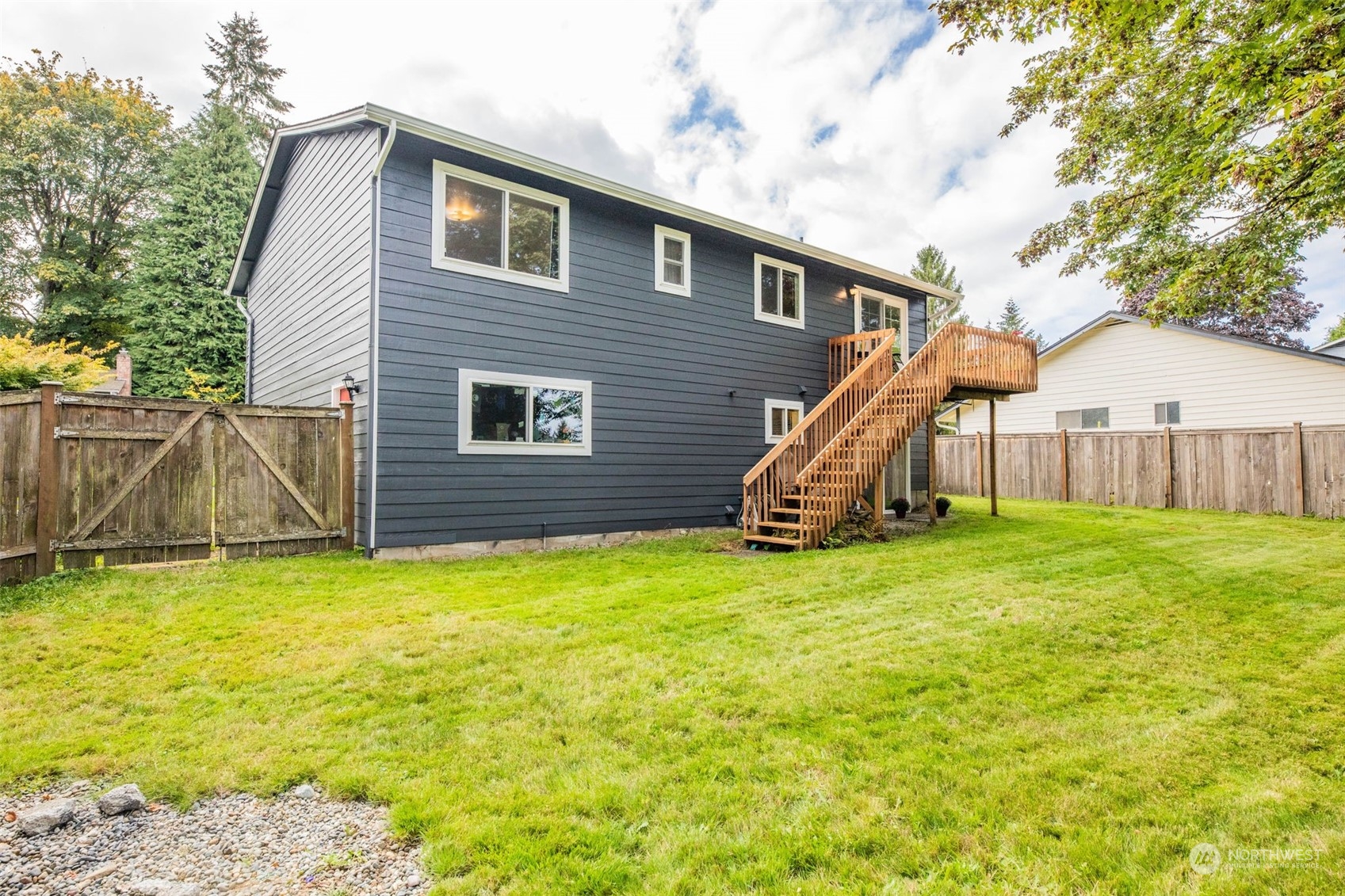 525 222nd Street Southwest Bothell, WA 98021 - Photo 23 of 25 a view of a house with backyard and a tree