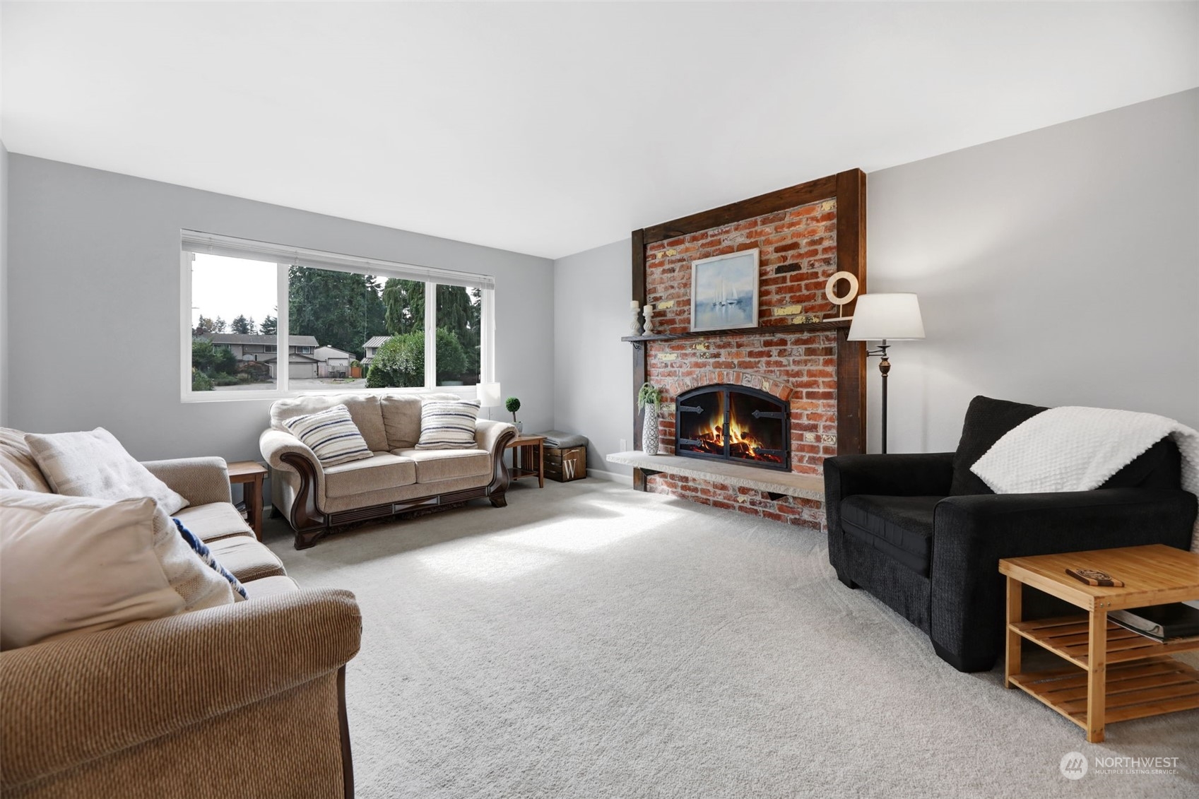 525 222nd Street Southwest Bothell, WA 98021 - Photo 4 of 25 a living room with furniture and a fireplace