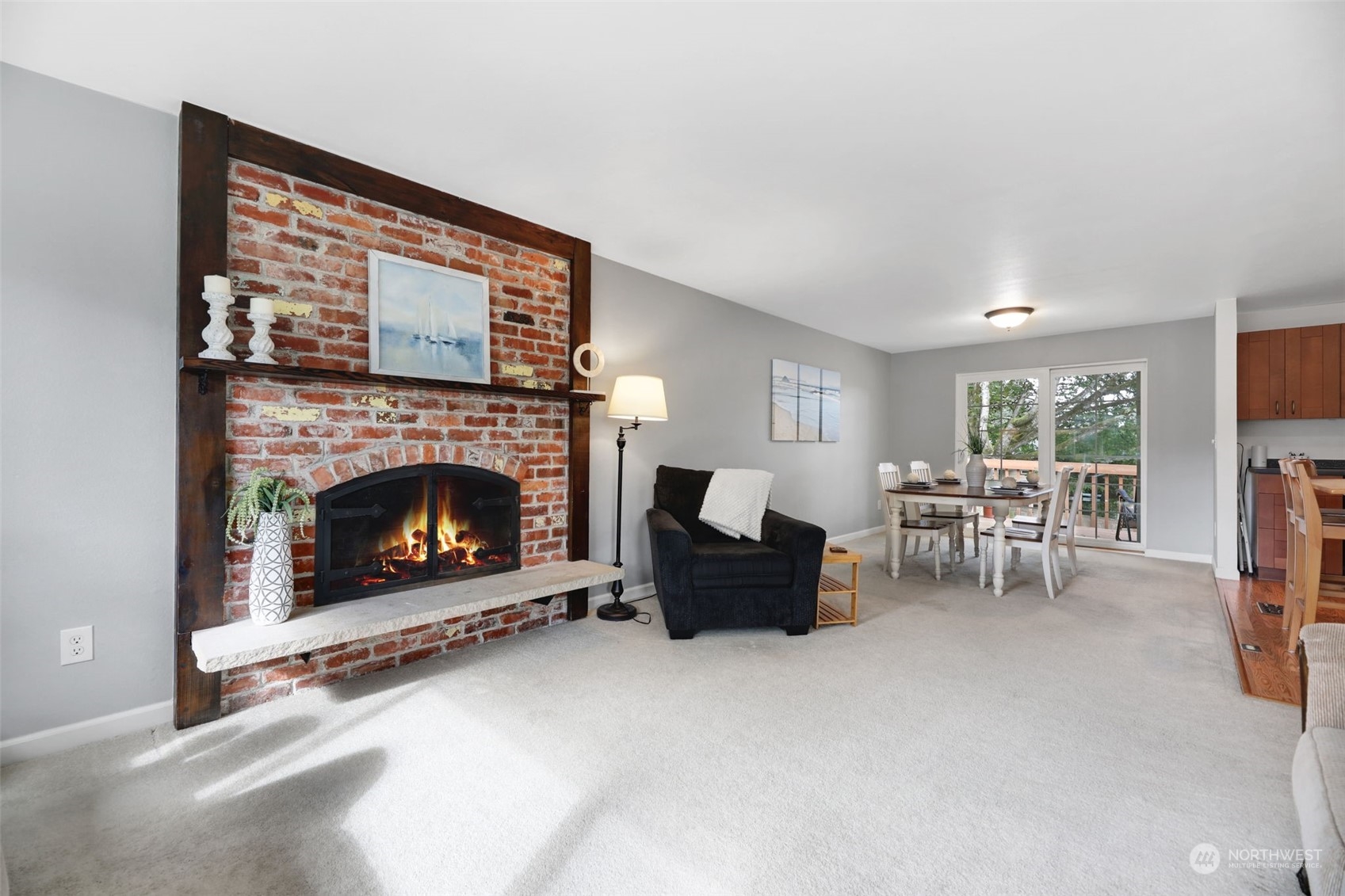 525 222nd Street Southwest Bothell, WA 98021 - Photo 5 of 25 a living room with furniture a fireplace and a flat screen tv