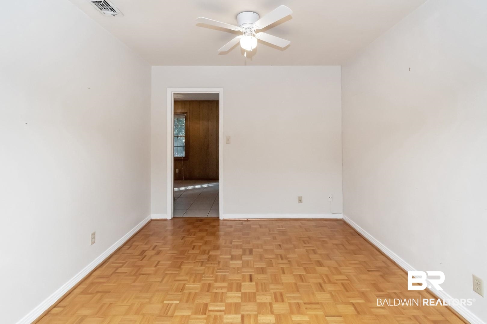 5517 Vanderbilt Drive Mobile, AL 36608 - Photo 9 of 33 Spare room featuring ceiling fan and light parquet flooring