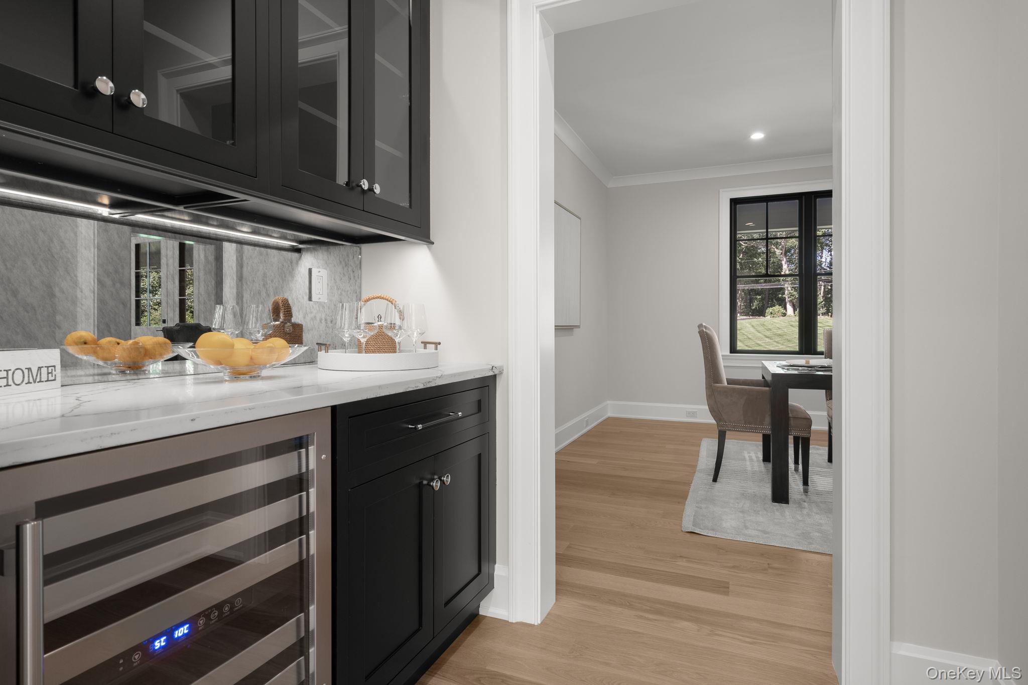 64 Saw Mill Road Cold Spring Harbor, NY 11724 - Photo 19 of 50 a kitchen with a sink cabinets and counter space