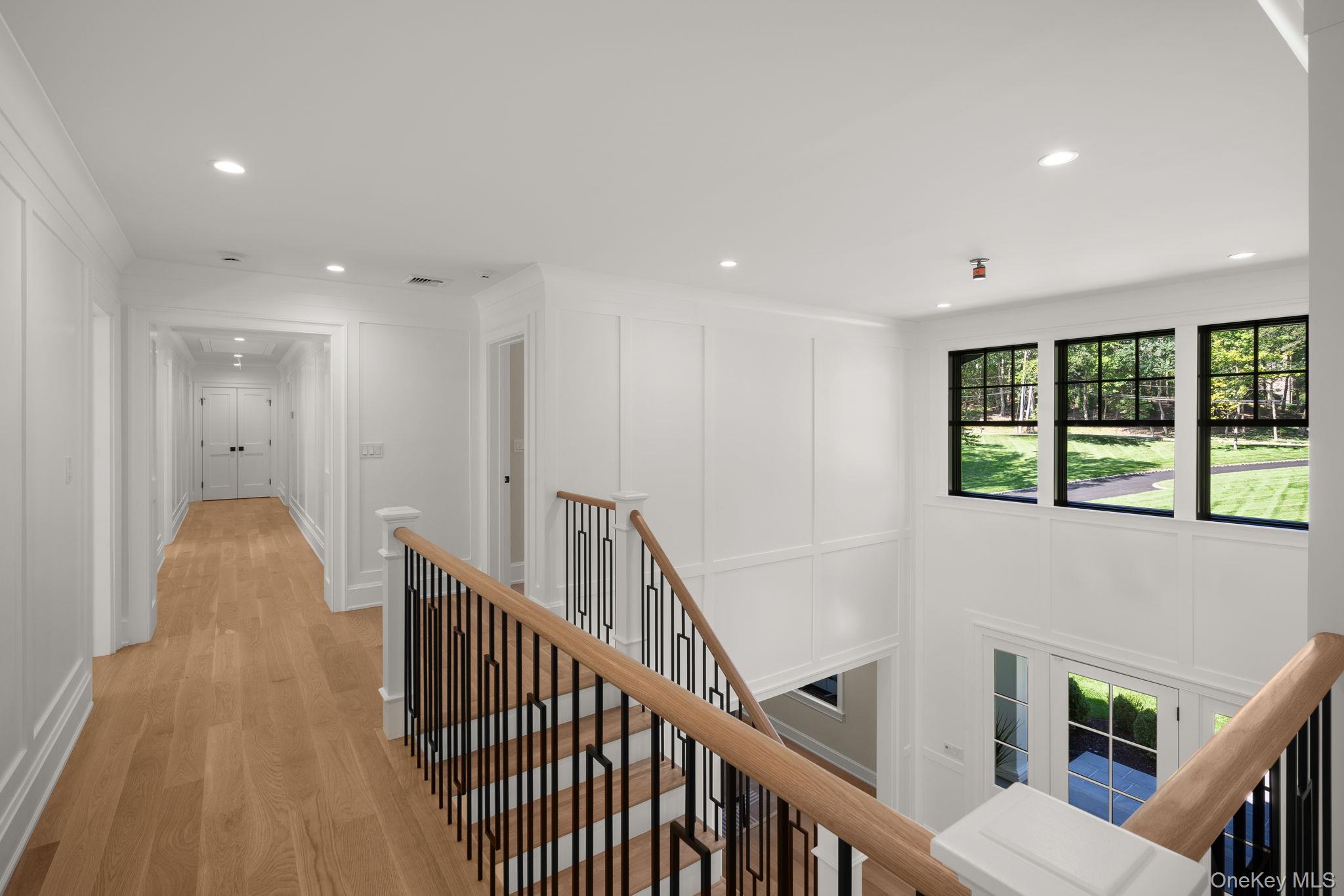 64 Saw Mill Road Cold Spring Harbor, NY 11724 - Photo 20 of 50 a view of entryway with wooden floor and windows