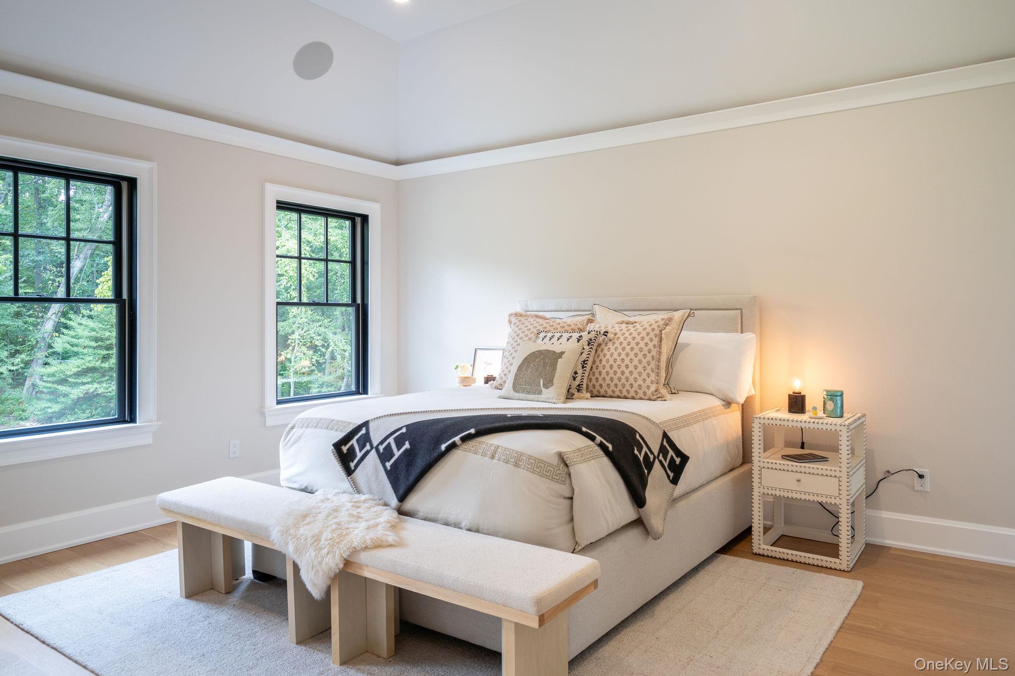 64 Saw Mill Road Cold Spring Harbor, NY 11724 - Photo 21 of 50 a bedroom with a bed and window