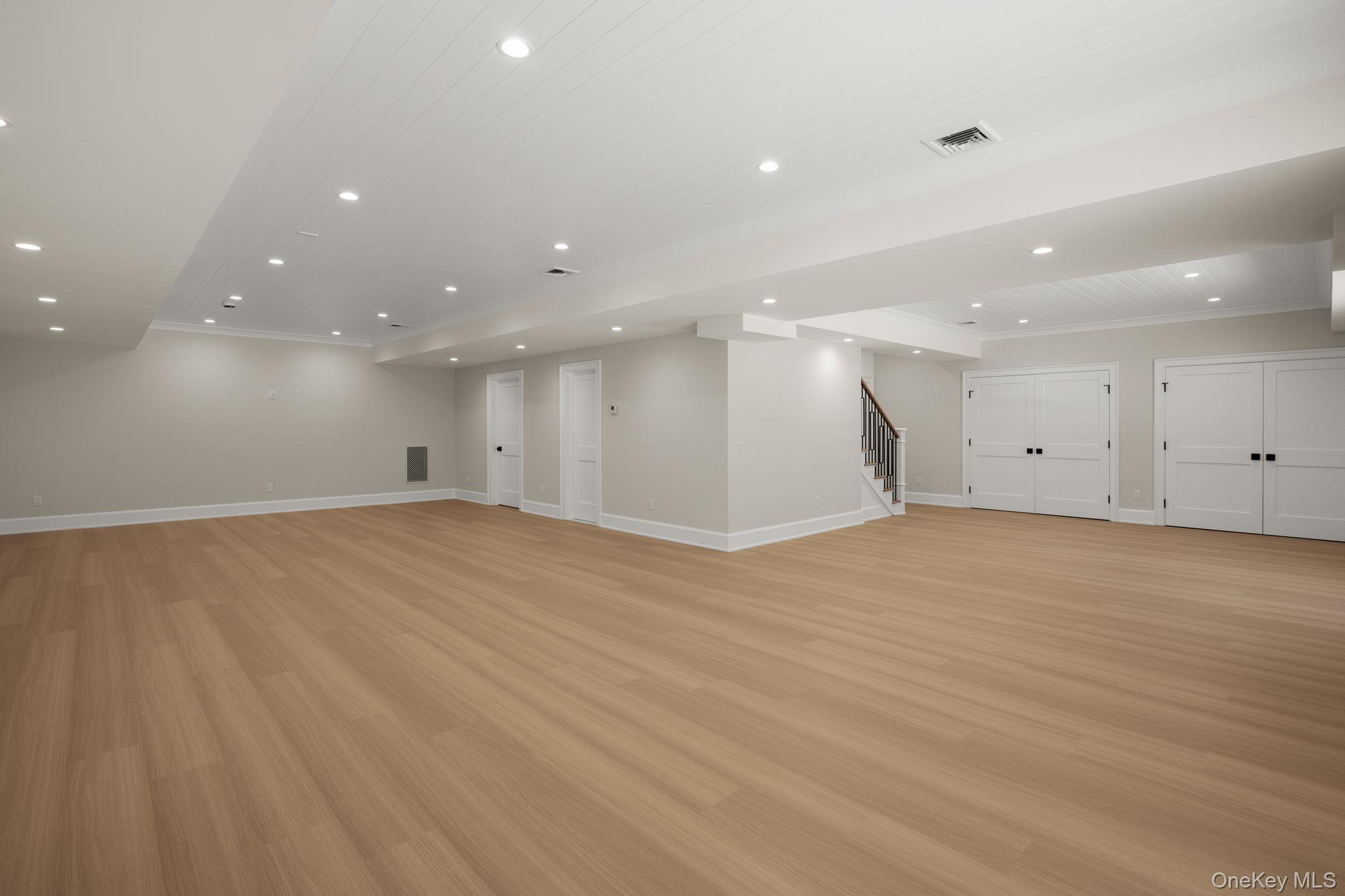 64 Saw Mill Road Cold Spring Harbor, NY 11724 - Photo 40 of 50 a view of empty room with wooden floor