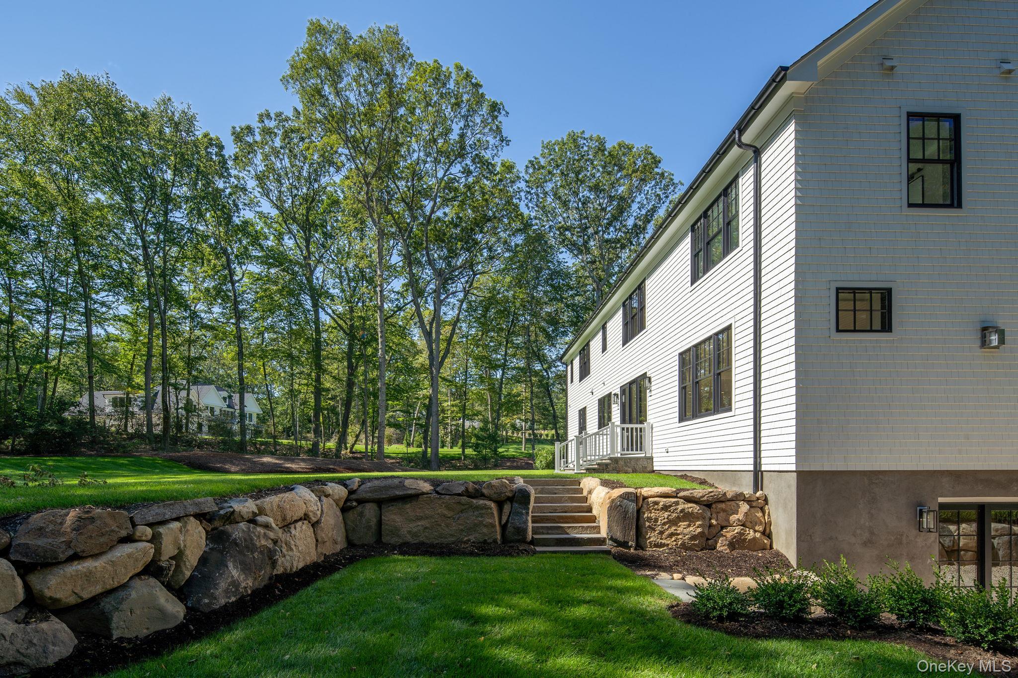 64 Saw Mill Road Cold Spring Harbor, NY 11724 - Photo 45 of 50 a view of house with backyard