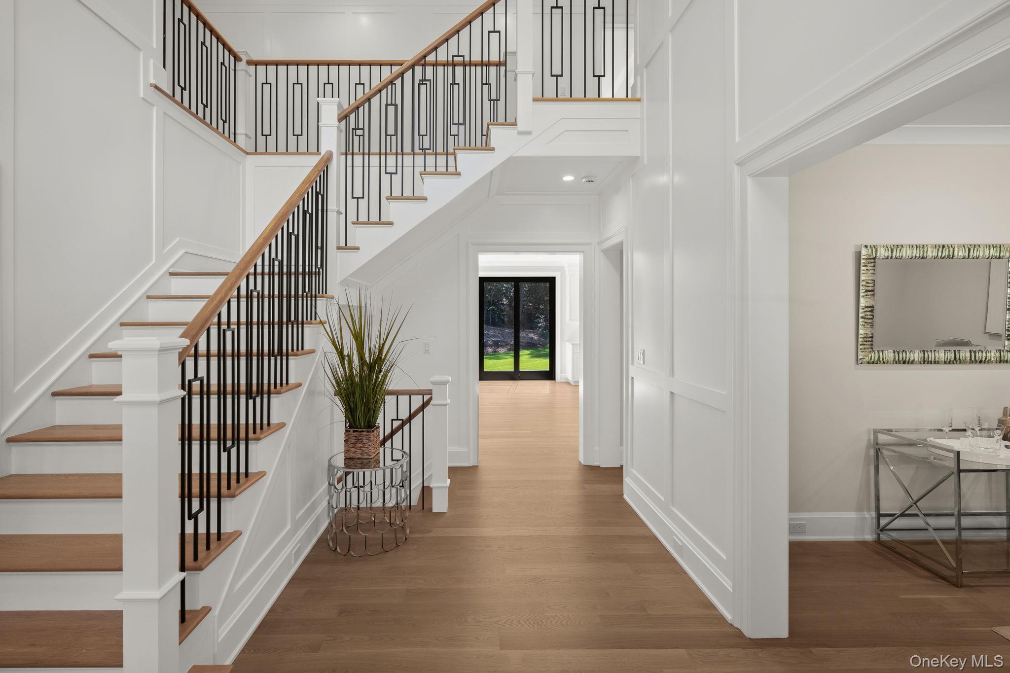 64 Saw Mill Road Cold Spring Harbor, NY 11724 - Photo 5 of 50 a view of entryway and hall with wooden floor