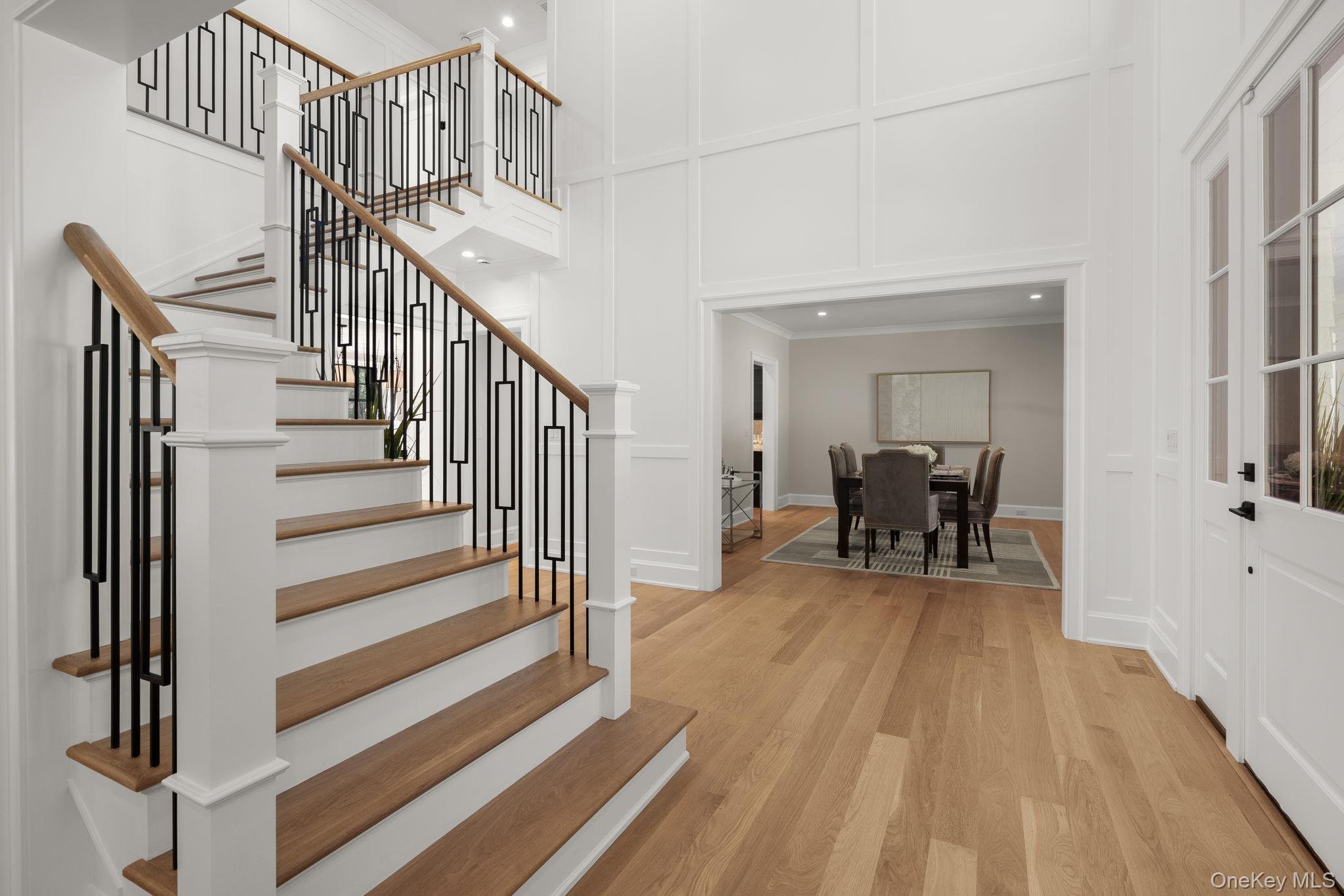 64 Saw Mill Road Cold Spring Harbor, NY 11724 - Photo 7 of 50 a view of entryway and hall with wooden floor