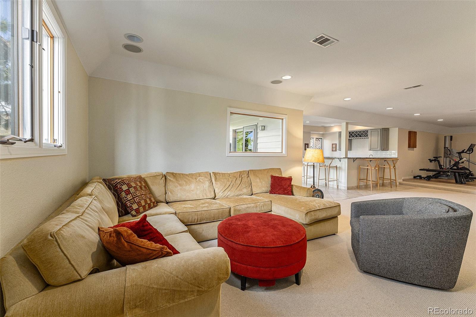 8 Blue Grouse Ridge Road Littleton, CO 80127 - Photo 35 of 49 a living room with furniture and a large window