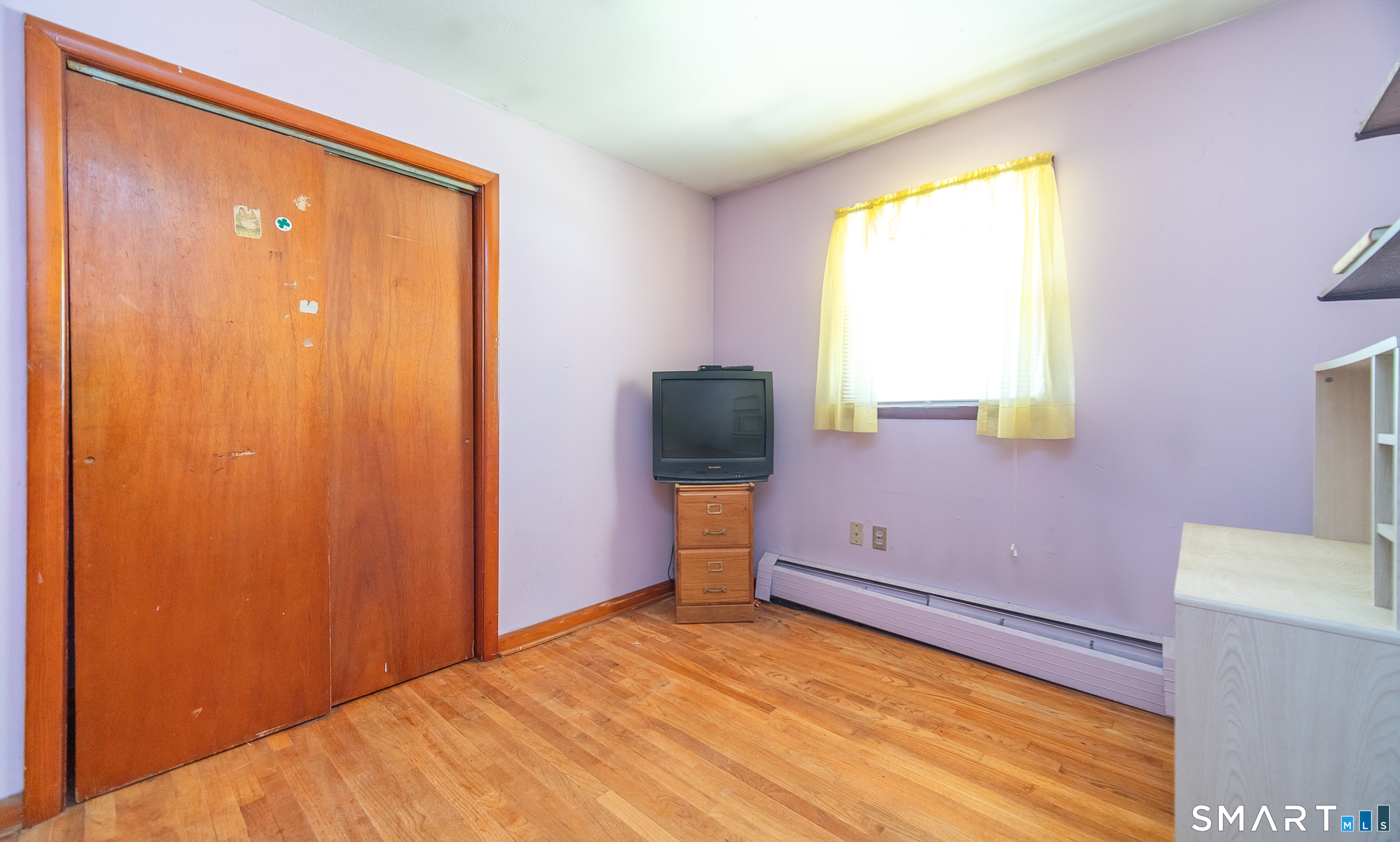 127 Bee Street Meriden, CT 06450 - Photo 20 of 32 a view of a room with wooden floor and furniture