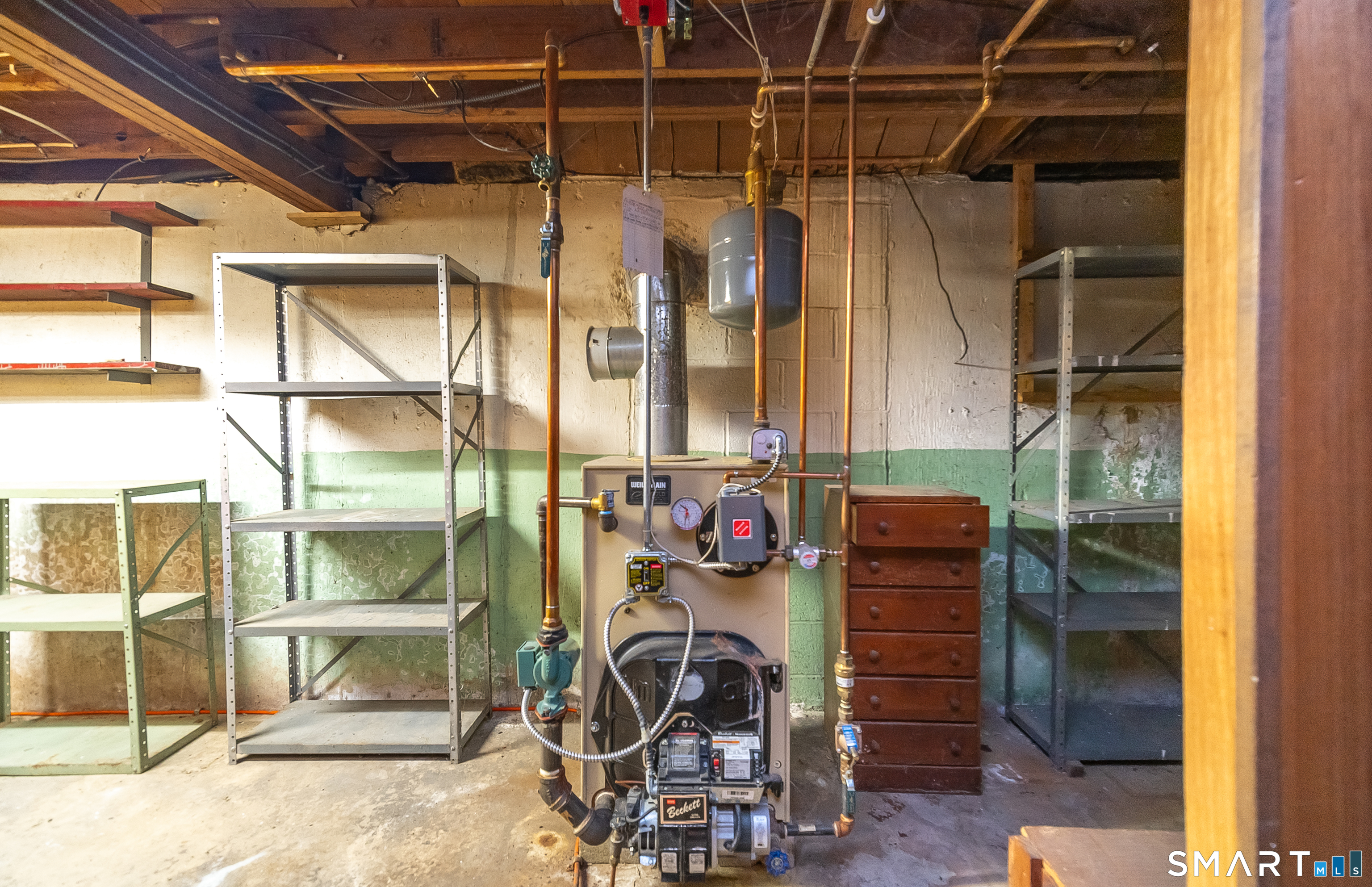 127 Bee Street Meriden, CT 06450 - Photo 27 of 32 a view of storage and utility room