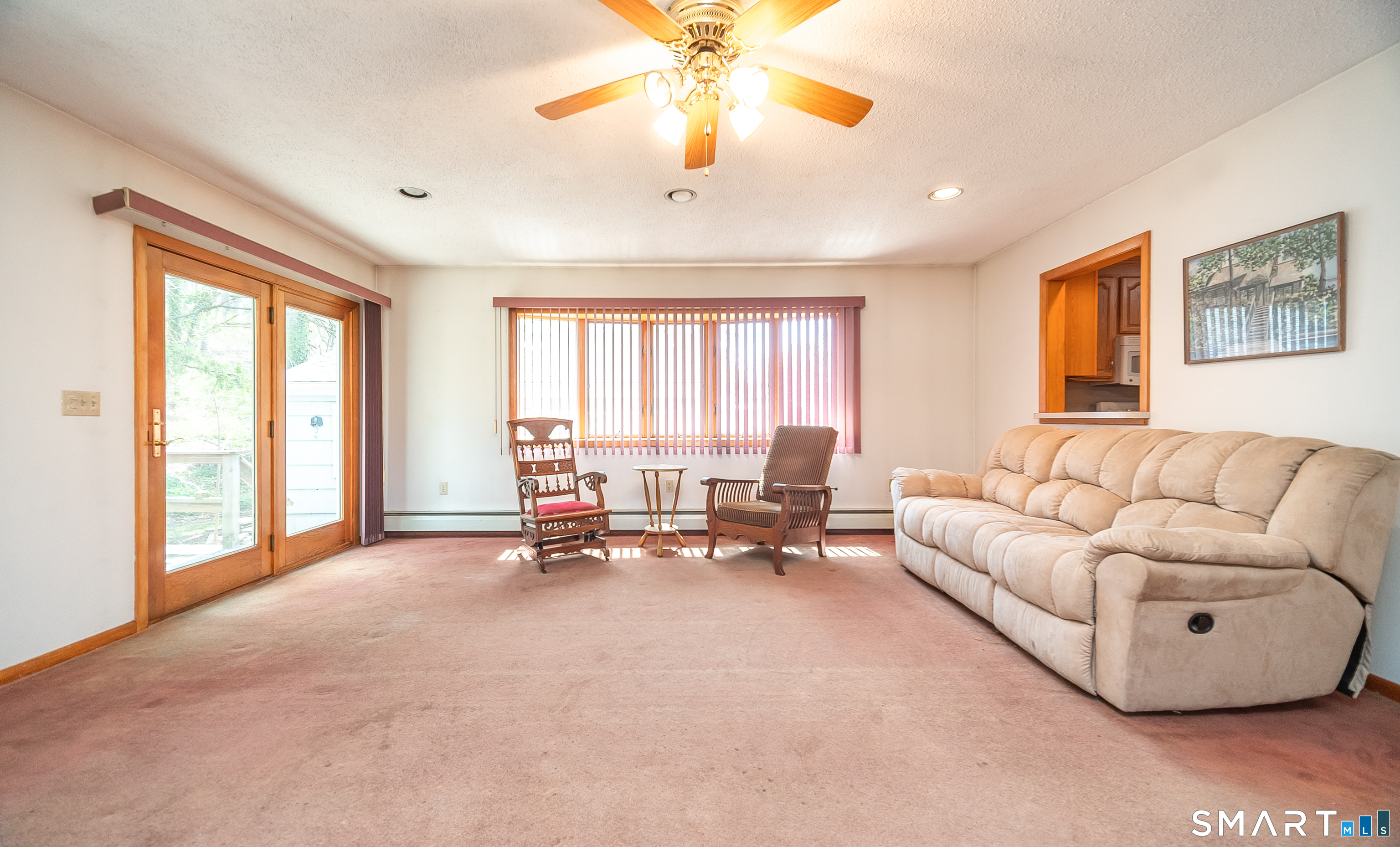 127 Bee Street Meriden, CT 06450 - Photo 6 of 32 a living room with furniture and large windows