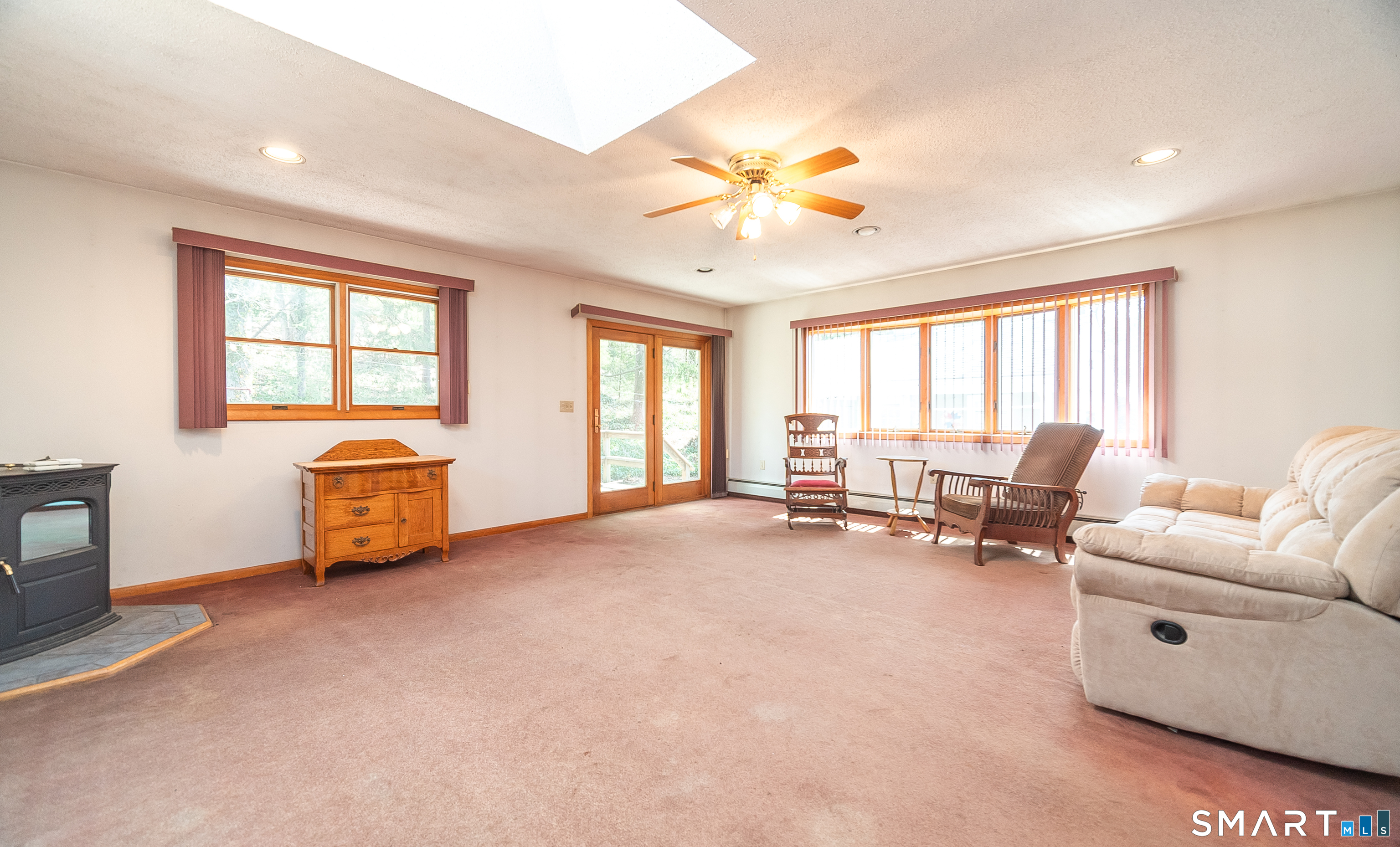 127 Bee Street Meriden, CT 06450 - Photo 8 of 32 a living room with furniture and a large window