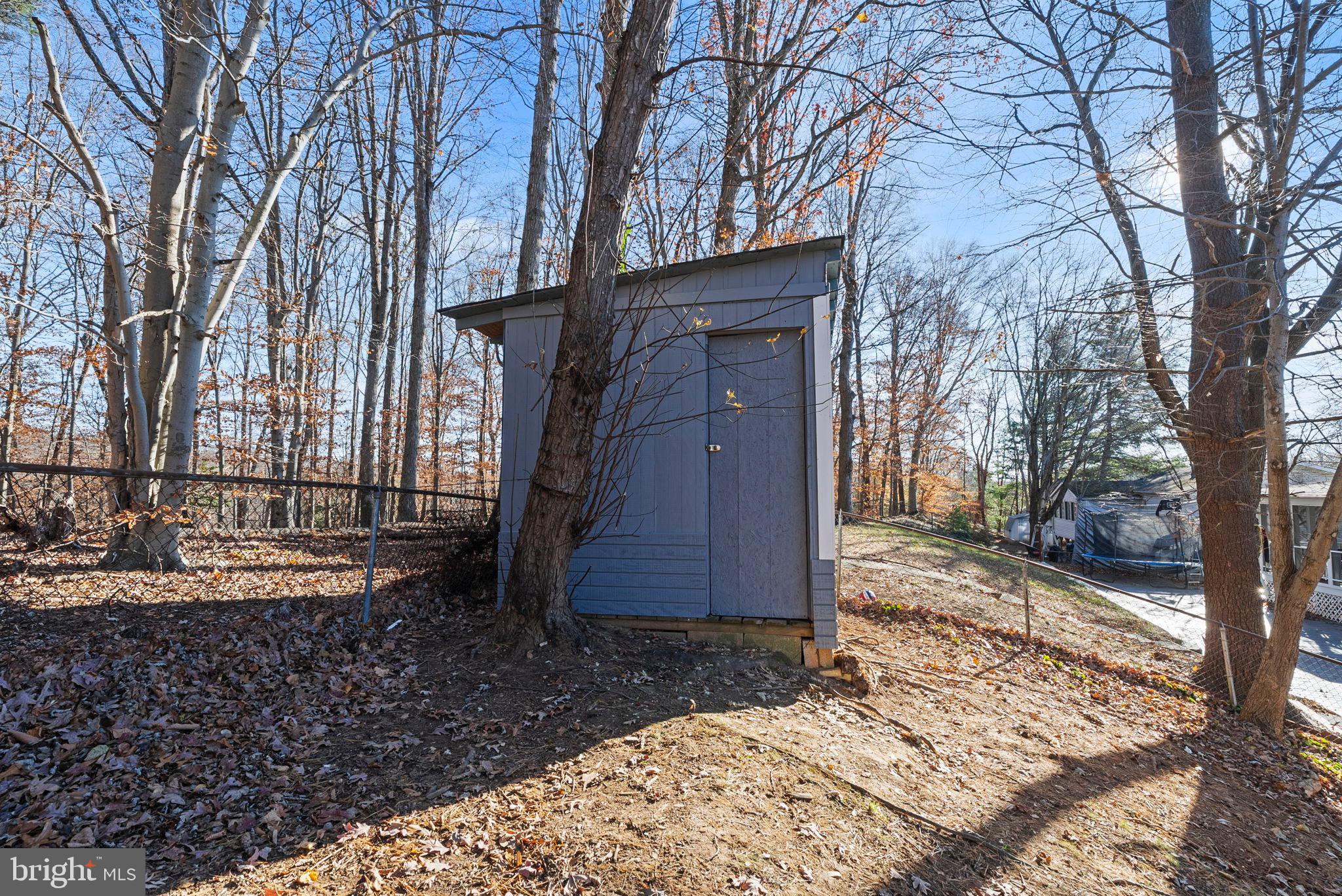 13421 Hillendale Drive Woodbridge, VA 22193 - Photo 17 of 28 a view of a house with a yard