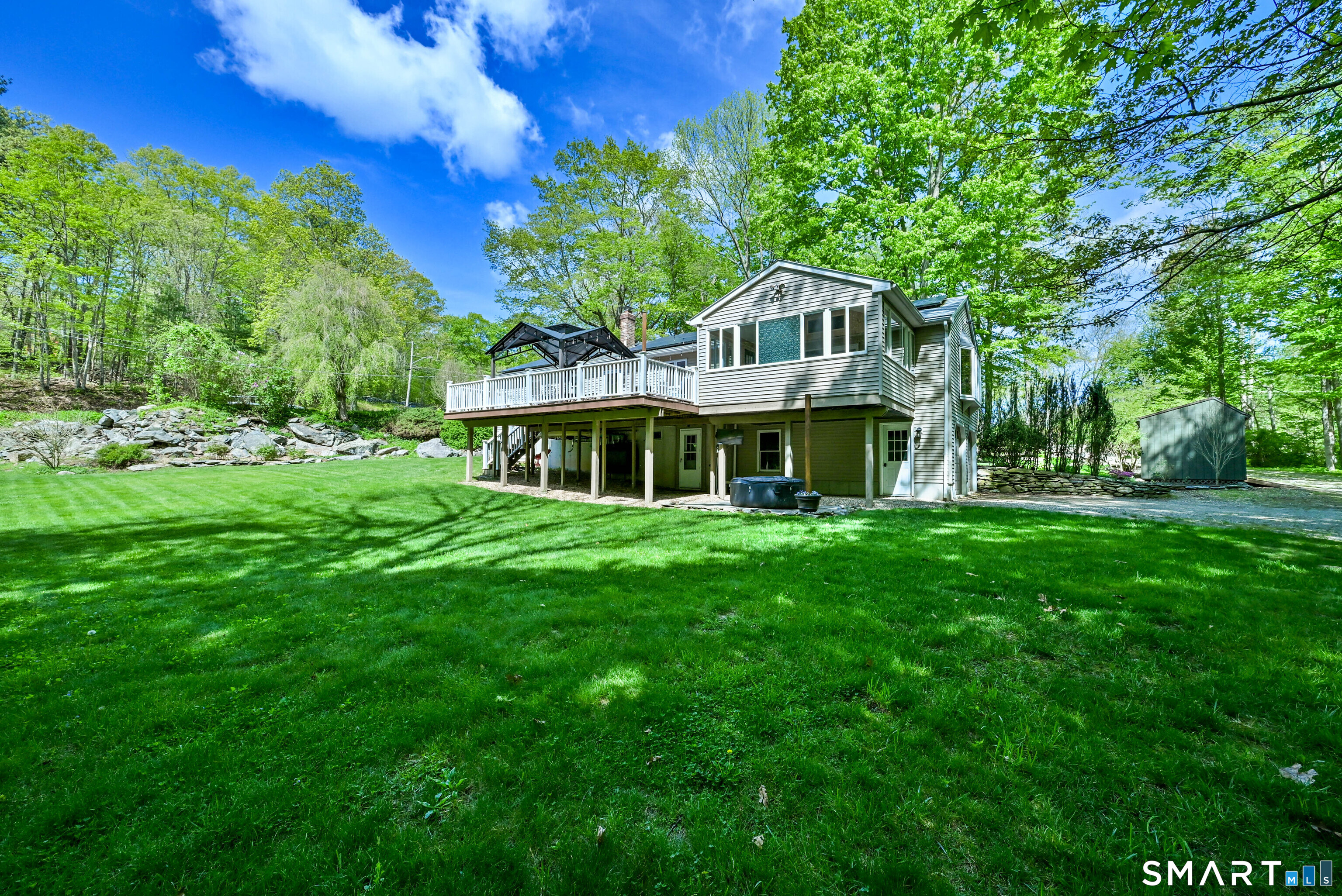 309 O'Leary Road Thompson, CT 06277 - Photo 5 of 40 a front view of a house with a garden