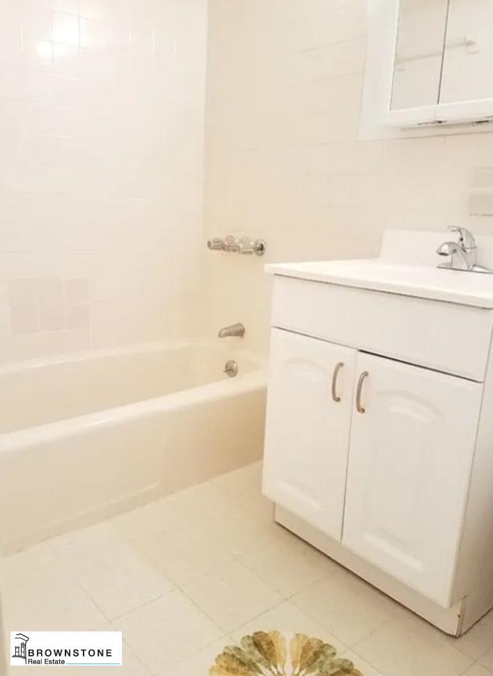 13 3rd Place, Unit 3 Brooklyn, NY 11231 - Photo 7 of 9 a bathroom with a bathtub and a shower