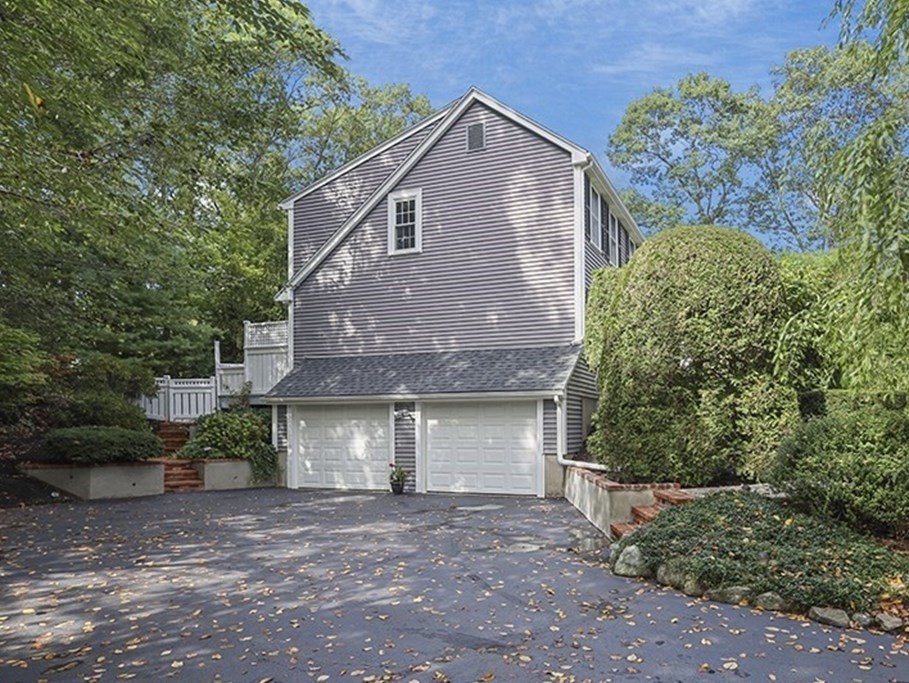 57 Vine Street North Attleboro, MA 02760 - Photo 11 of 41 a front view of a house with a yard and garage