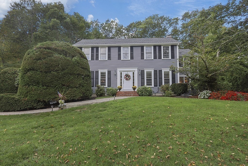 57 Vine Street North Attleboro, MA 02760 - Photo 2 of 41 a front view of a house with a yard