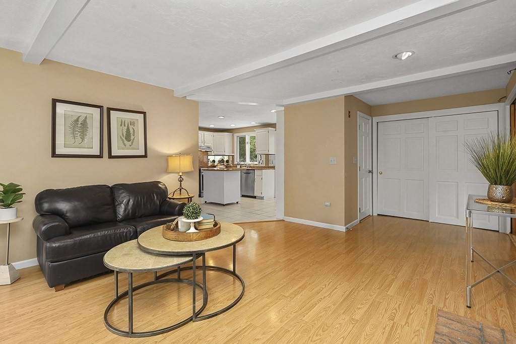 57 Vine Street North Attleboro, MA 02760 - Photo 26 of 41 a living room with furniture and a table
