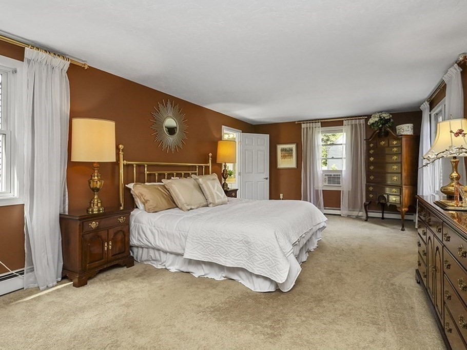 57 Vine Street North Attleboro, MA 02760 - Photo 28 of 41 a spacious bedroom with a bed and window