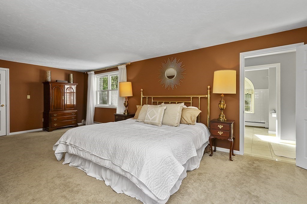 57 Vine Street North Attleboro, MA 02760 - Photo 29 of 41 a bedroom with a bed and a dresser