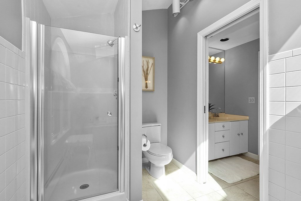 57 Vine Street North Attleboro, MA 02760 - Photo 31 of 41 a bathroom with a shower and a toilet