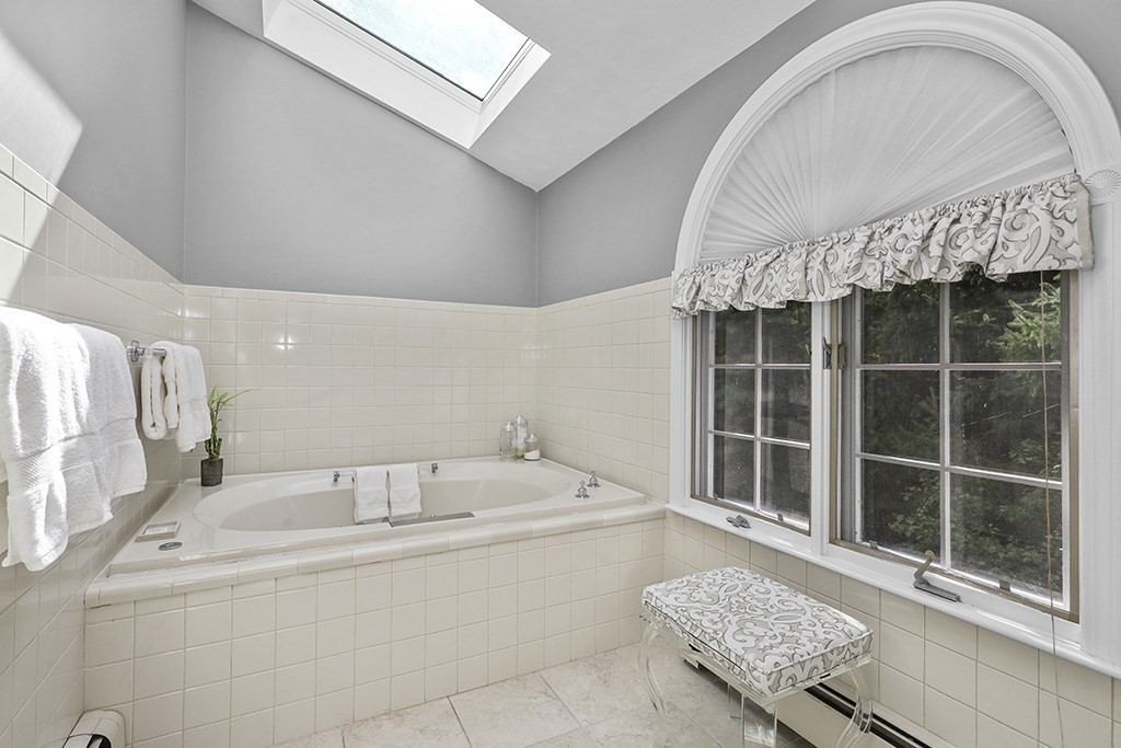57 Vine Street North Attleboro, MA 02760 - Photo 32 of 41 a bathroom with a tub sink and shower