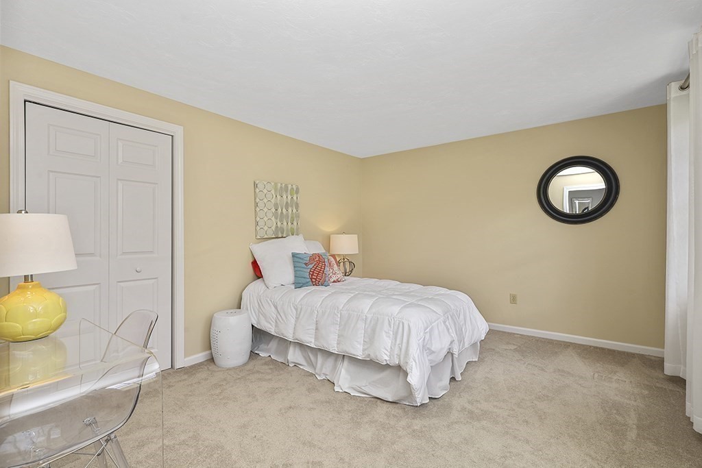 57 Vine Street North Attleboro, MA 02760 - Photo 38 of 41 a bedroom with a bed and a window