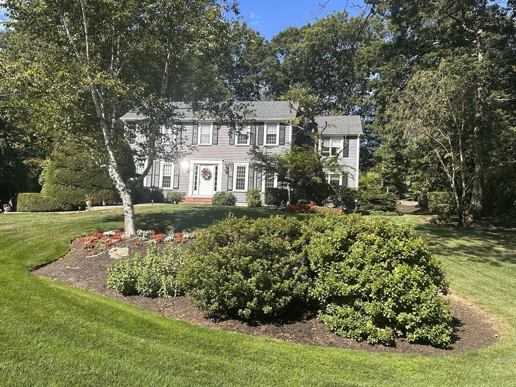 57 Vine Street North Attleboro, MA 02760 - Photo 4 of 41 a front view of a house with a yard