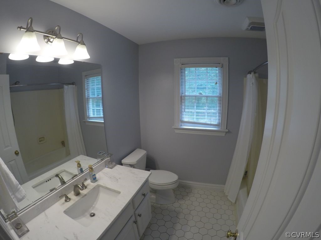 14101 Princess Mary Road Chesterfield, VA 23838 - Photo 34 of 44 a bathroom with a sink vanity and a mirror