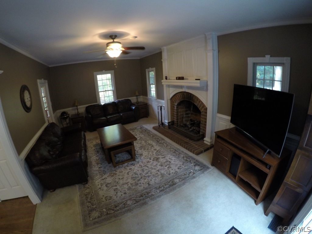 14101 Princess Mary Road Chesterfield, VA 23838 - Photo 6 of 44 a living room with furniture and a fireplace