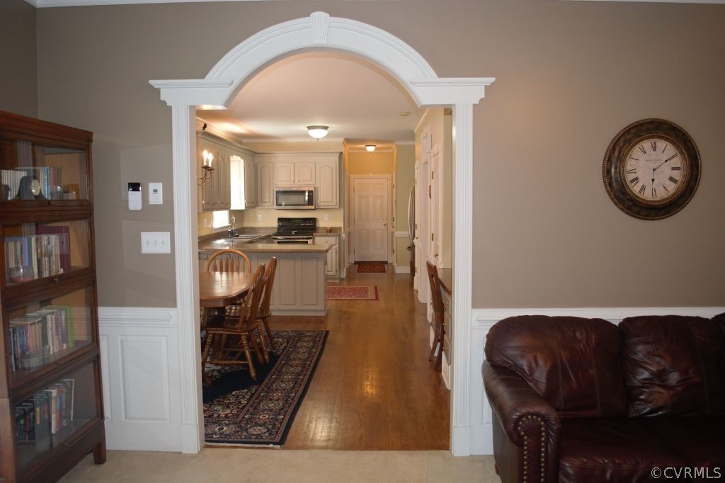 14101 Princess Mary Road Chesterfield, VA 23838 - Photo 8 of 44 a living room with furniture and a view of kitchen