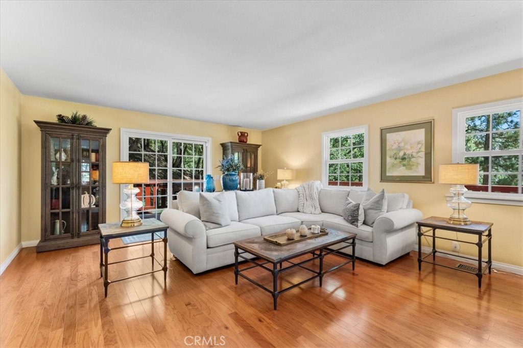 869 Mockingbird Road Wrightwood, CA 92397 - Photo 17 of 35 a living room with furniture and a wooden floor