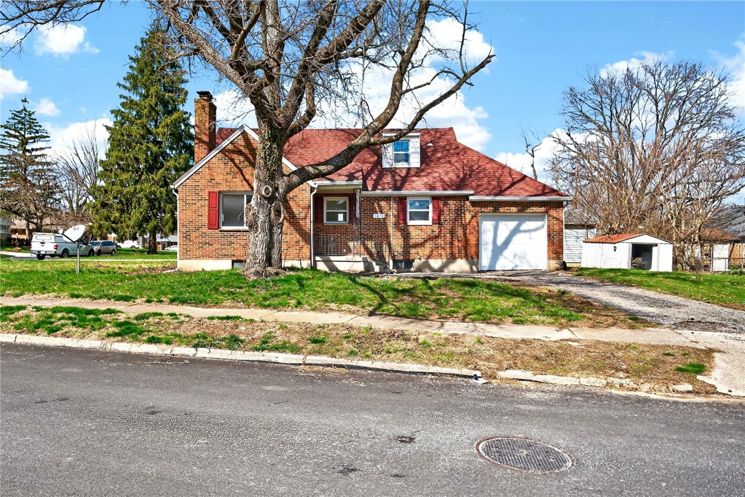 1243 Ridgeview Avenue Dayton, OH 45409 - Photo 50 of 56 This classic brick residence features a durable red roof and an inviting front yard.