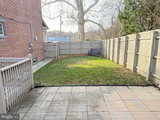 a view of balcony with wooden floor