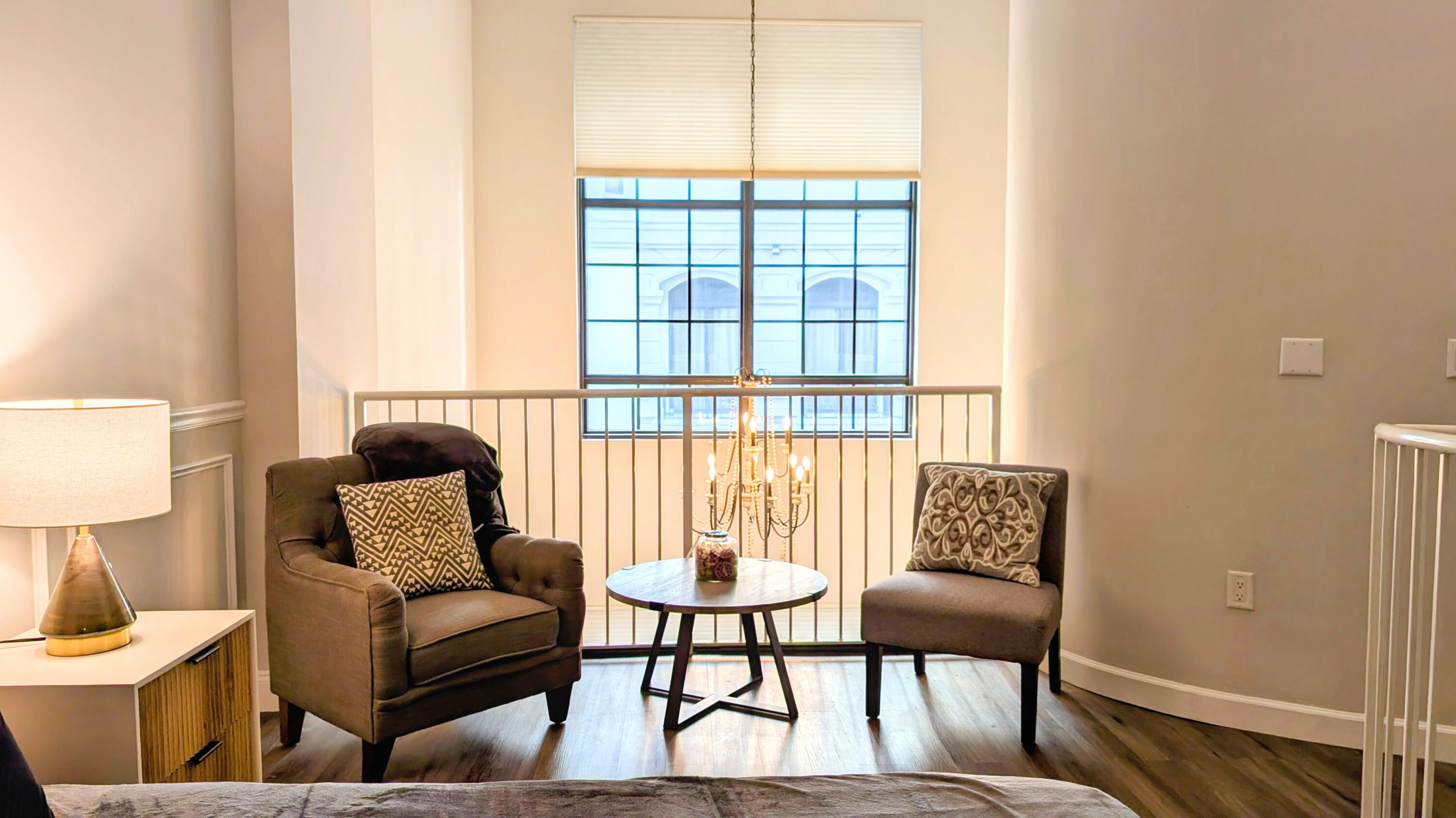 801 South Olive Avenue, Unit 435 West Palm Beach, FL 33401 - Photo 14 of 33 a living room with furniture and a window