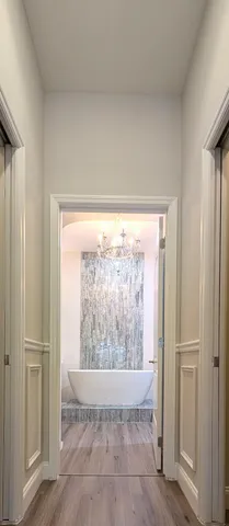 a bathroom with a bathtub and sink