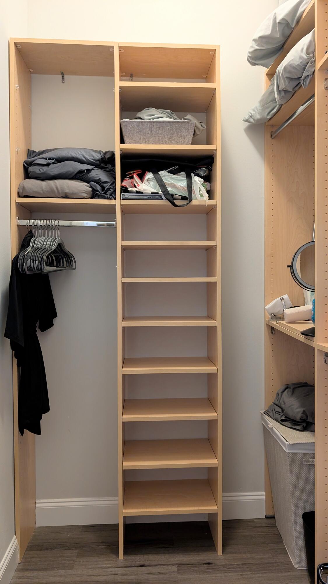 801 South Olive Avenue, Unit 435 West Palm Beach, FL 33401 - Photo 19 of 33 a view of walk in closet with clothes and shoes