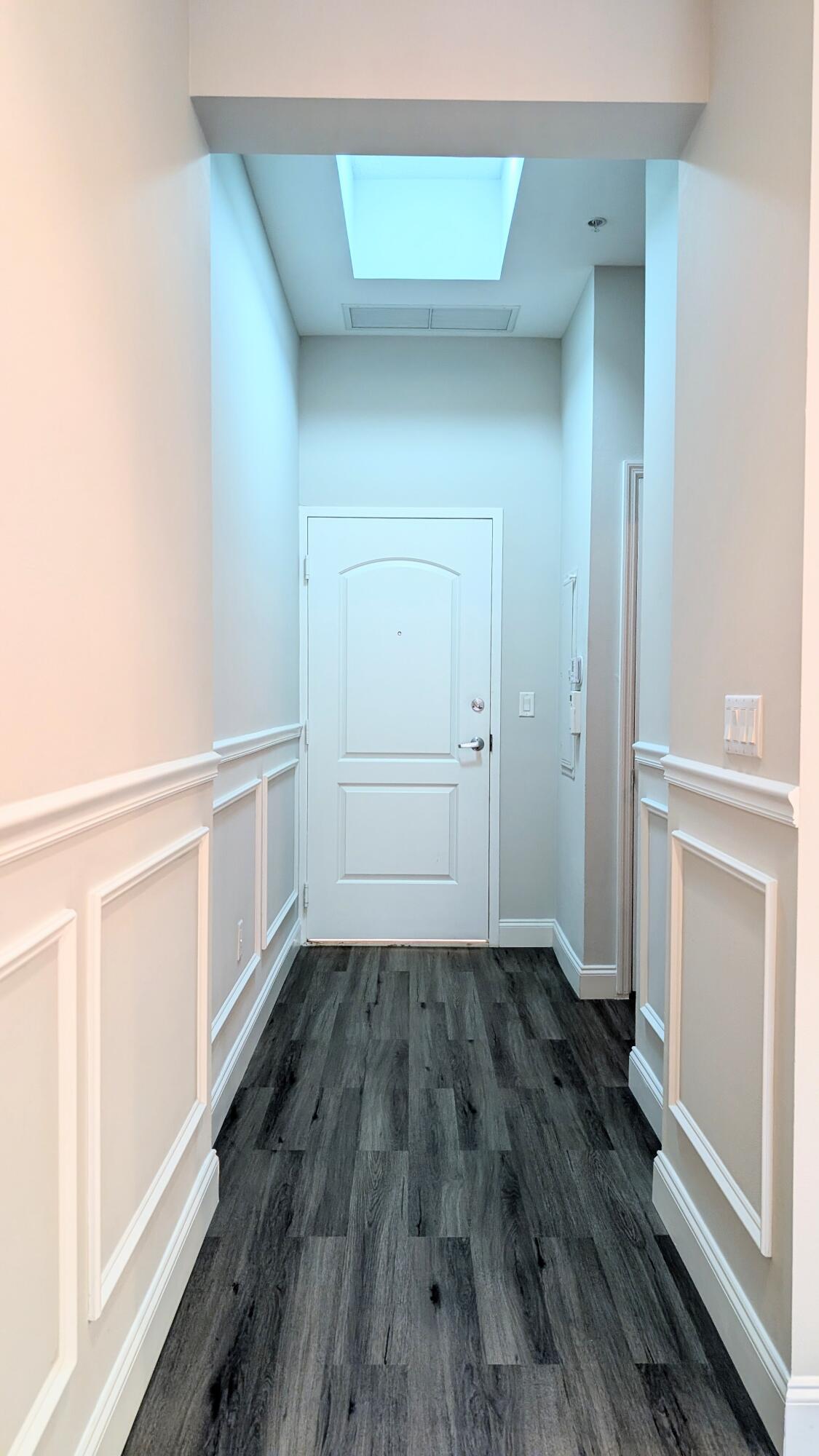 801 South Olive Avenue, Unit 435 West Palm Beach, FL 33401 - Photo 21 of 33 wooden floor in an empty room