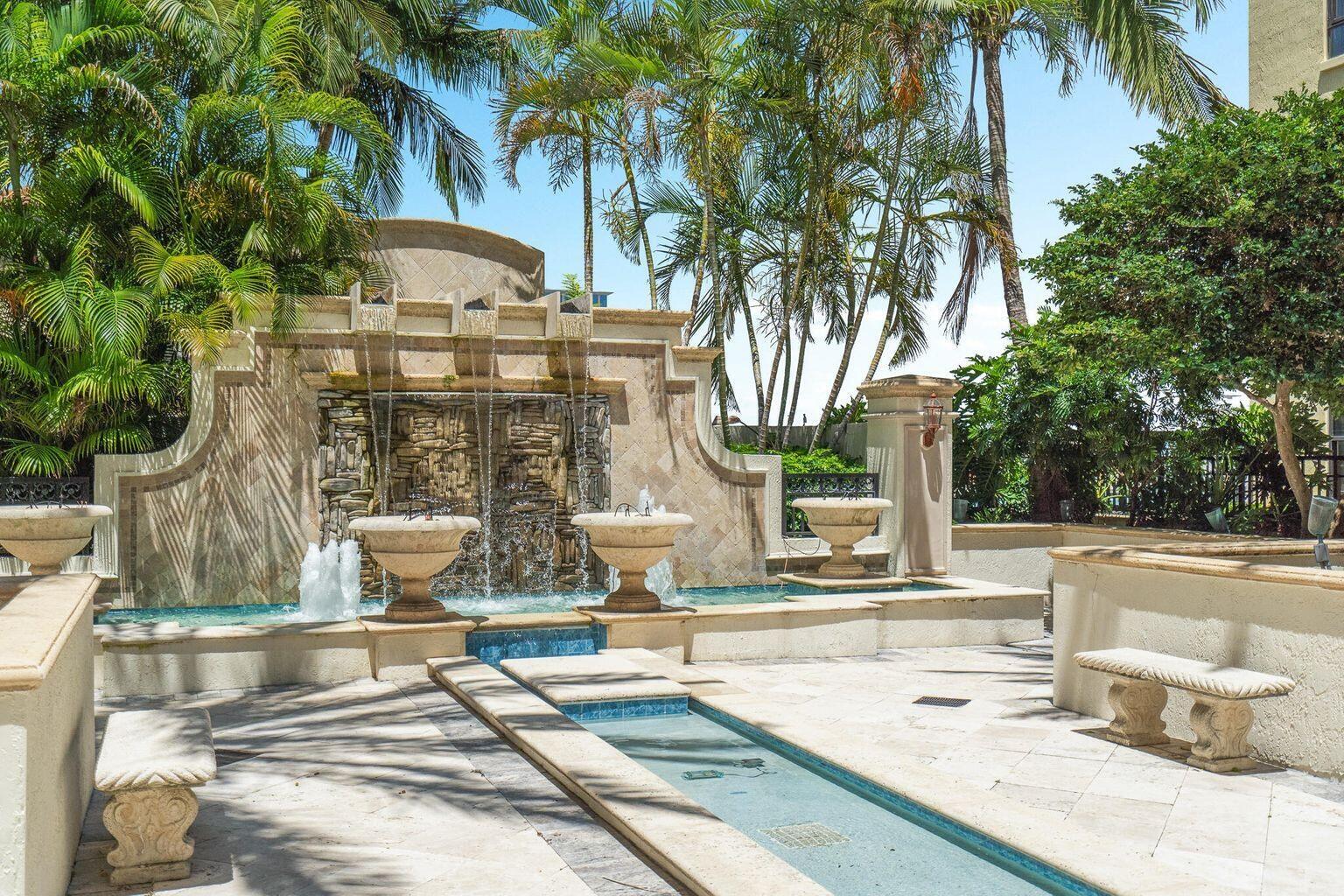 801 South Olive Avenue, Unit 435 West Palm Beach, FL 33401 - Photo 29 of 33 a outdoor space with lots of palm trees