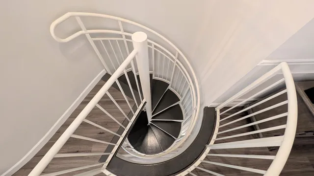 a kitchen with stainless steel appliances granite countertop a refrigerator and a stove