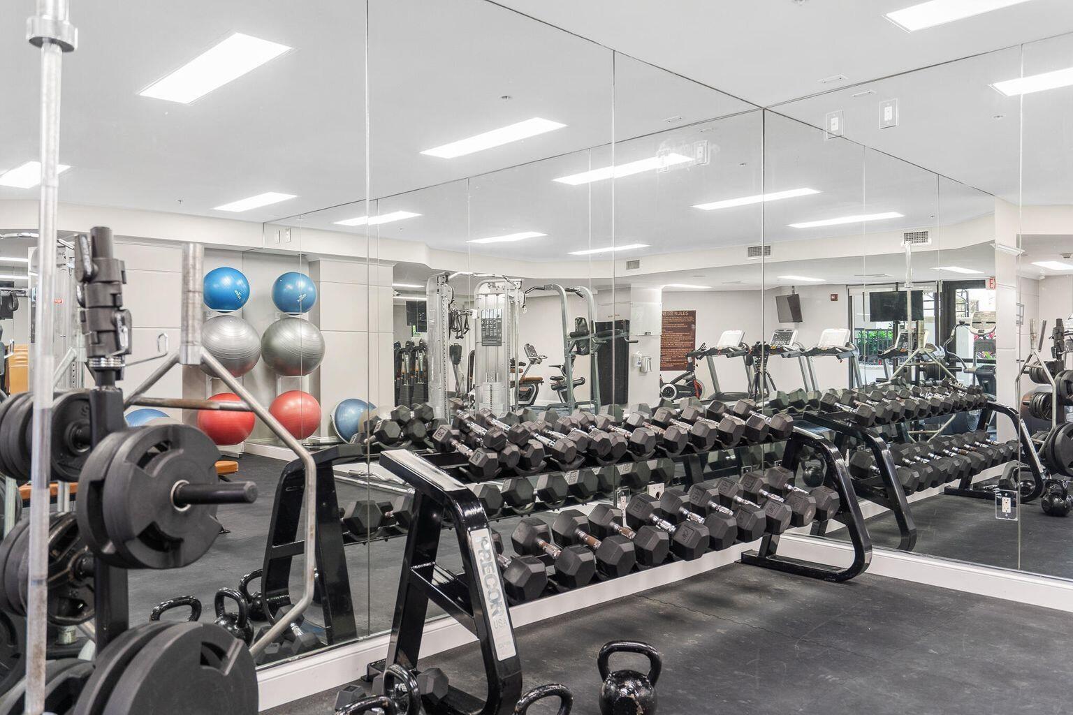 801 South Olive Avenue, Unit 435 West Palm Beach, FL 33401 - Photo 31 of 33 a view of a room with gym equipment