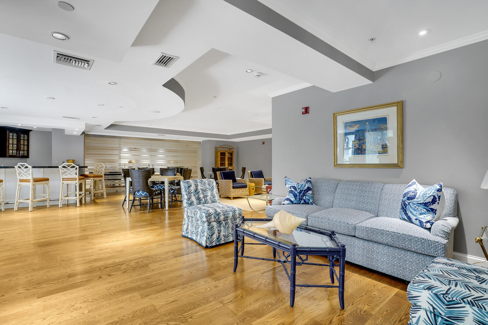 801 South Olive Avenue, Unit 435 West Palm Beach, FL 33401 - Photo 32 of 33 a living room with furniture and kitchen view