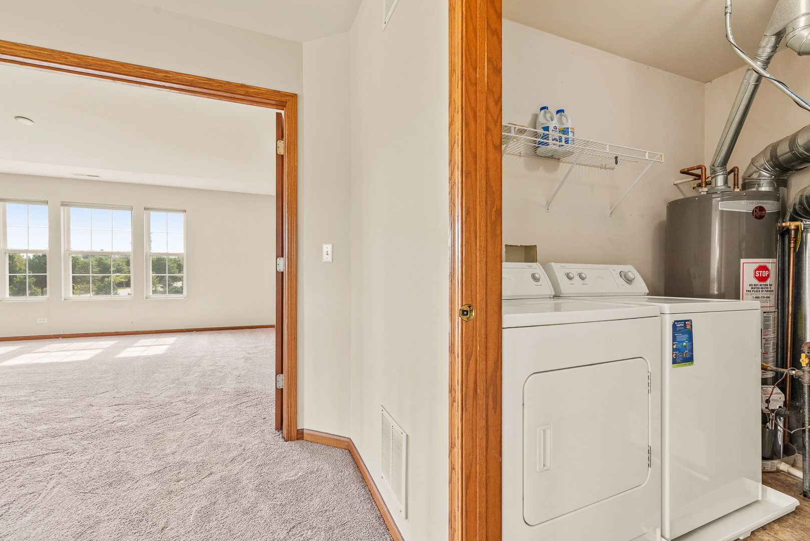 850 County Line Road, Unit 850 Aurora, IL 60502 - Photo 13 of 20 a utility room with dryer and washer