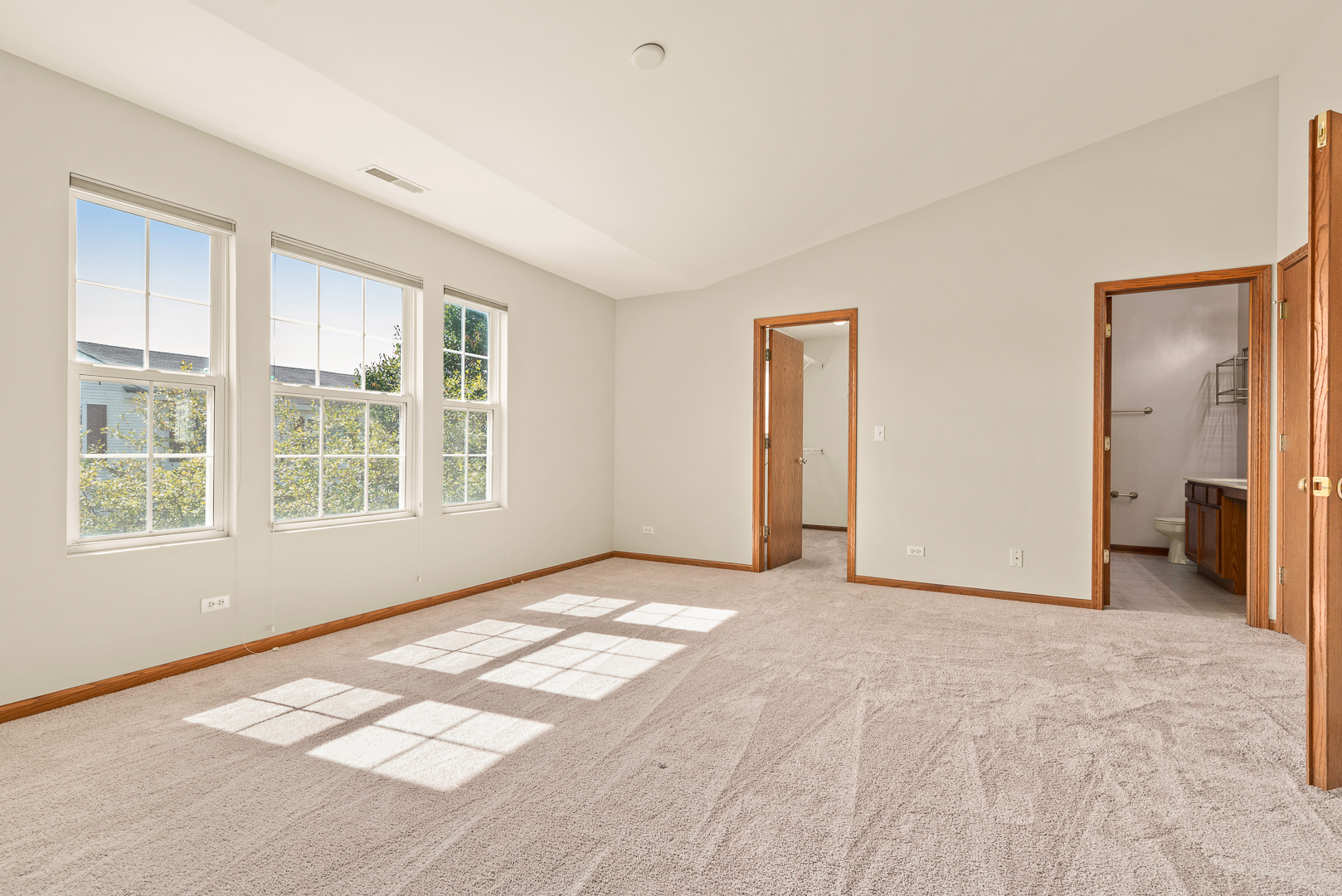 850 County Line Road, Unit 850 Aurora, IL 60502 - Photo 14 of 20 a view of an empty room with a window