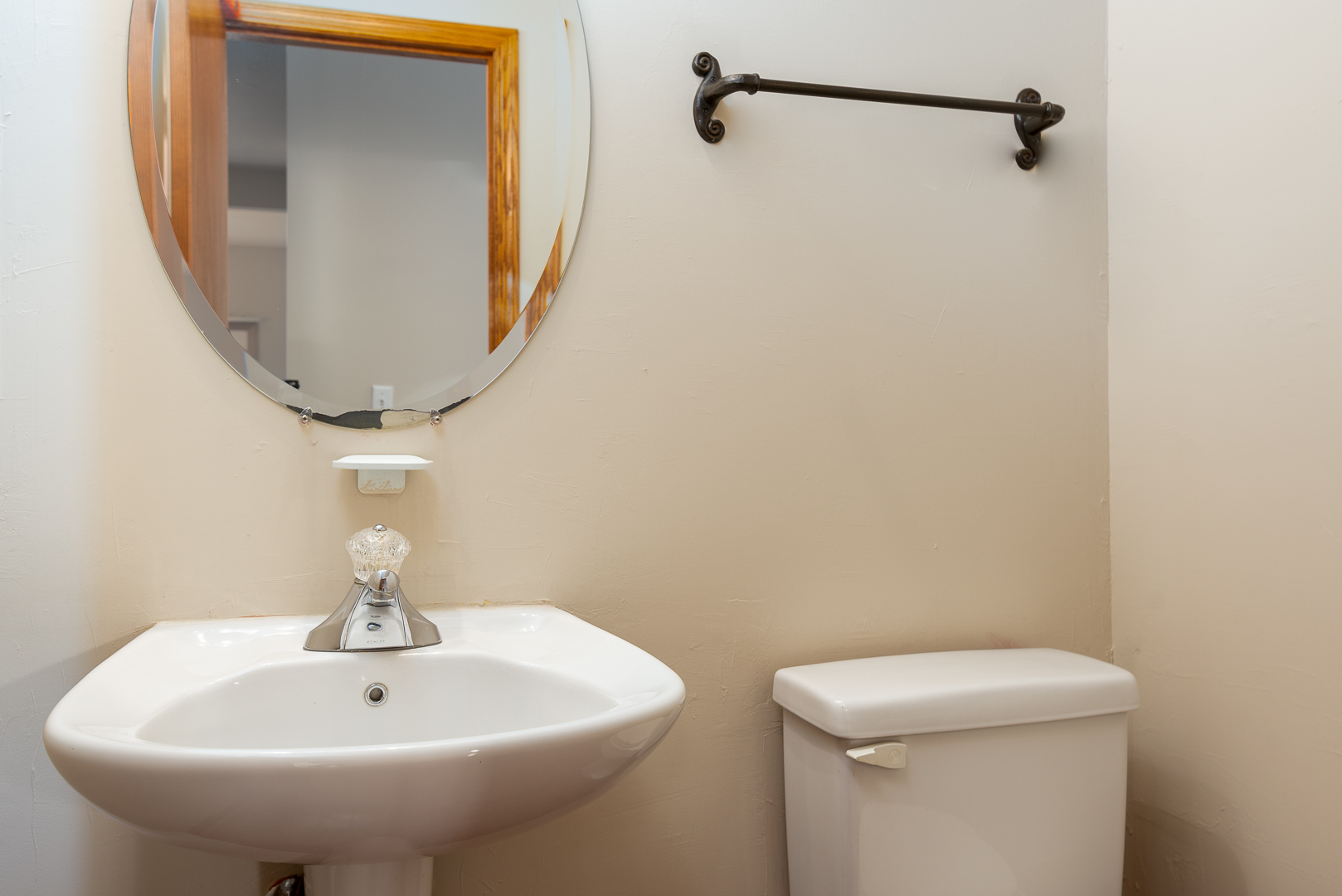 850 County Line Road, Unit 850 Aurora, IL 60502 - Photo 8 of 20 a bathroom with a sink a toilet and mirror