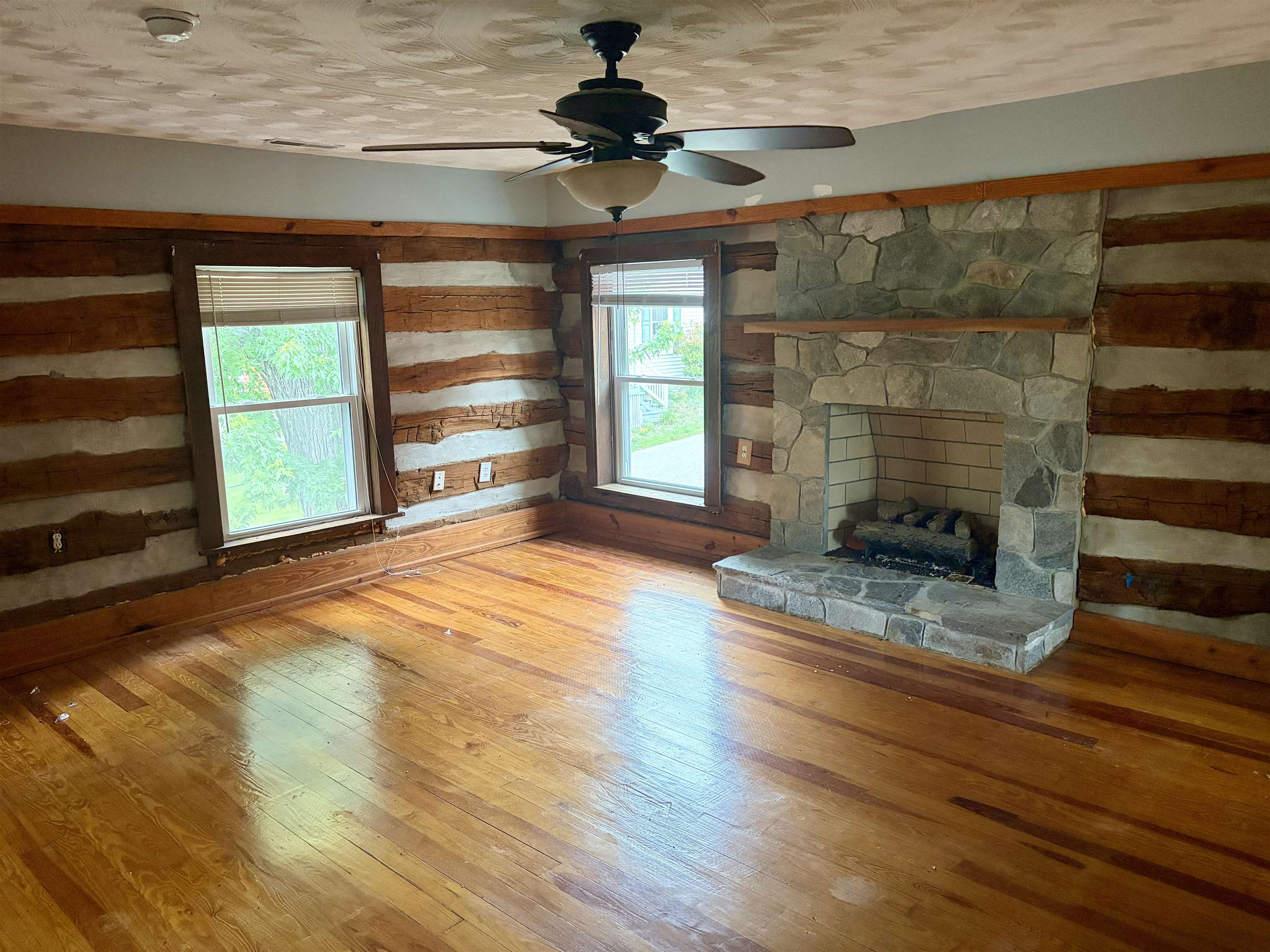 3648 Middlebrook Village Road Middlebrook, VA 24459 - Photo 16 of 48 a view of empty room with wooden floor and fan