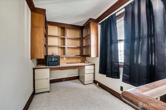 a room with a bed and a window